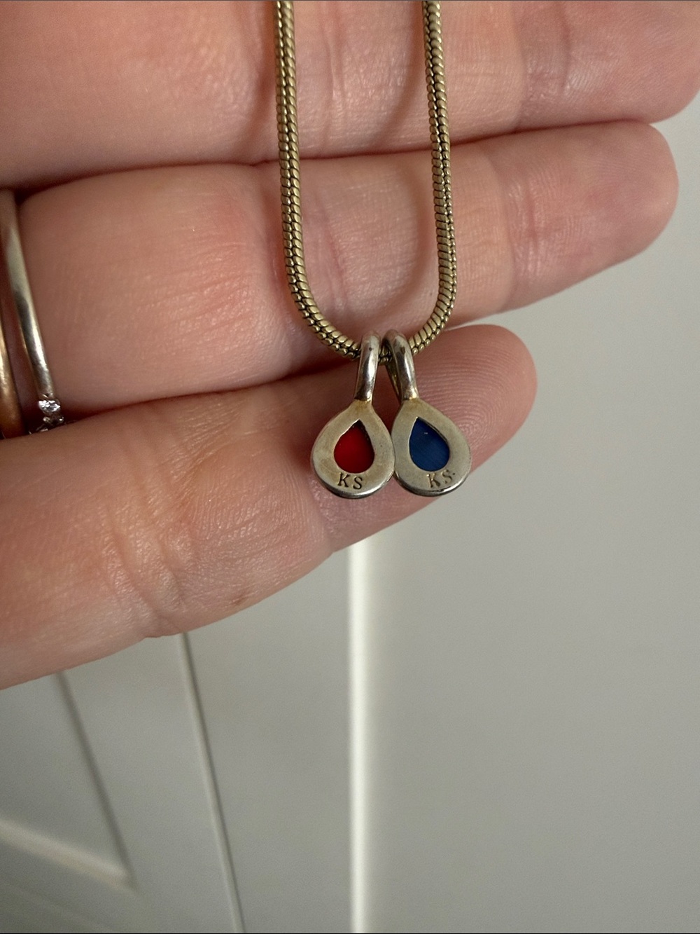 Kendra Scott Pendant Necklace with Red and Blue birth stones